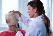 Female doctor examining a patient